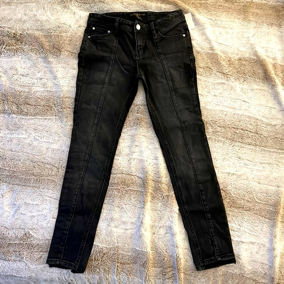 Black jeans with tailor stitch down the thigh line. - Picture 1 of 2